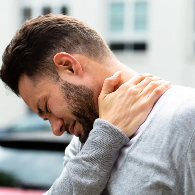 Male patient with neck pain looking for relief at Mesa Arizona chiropractic clinic