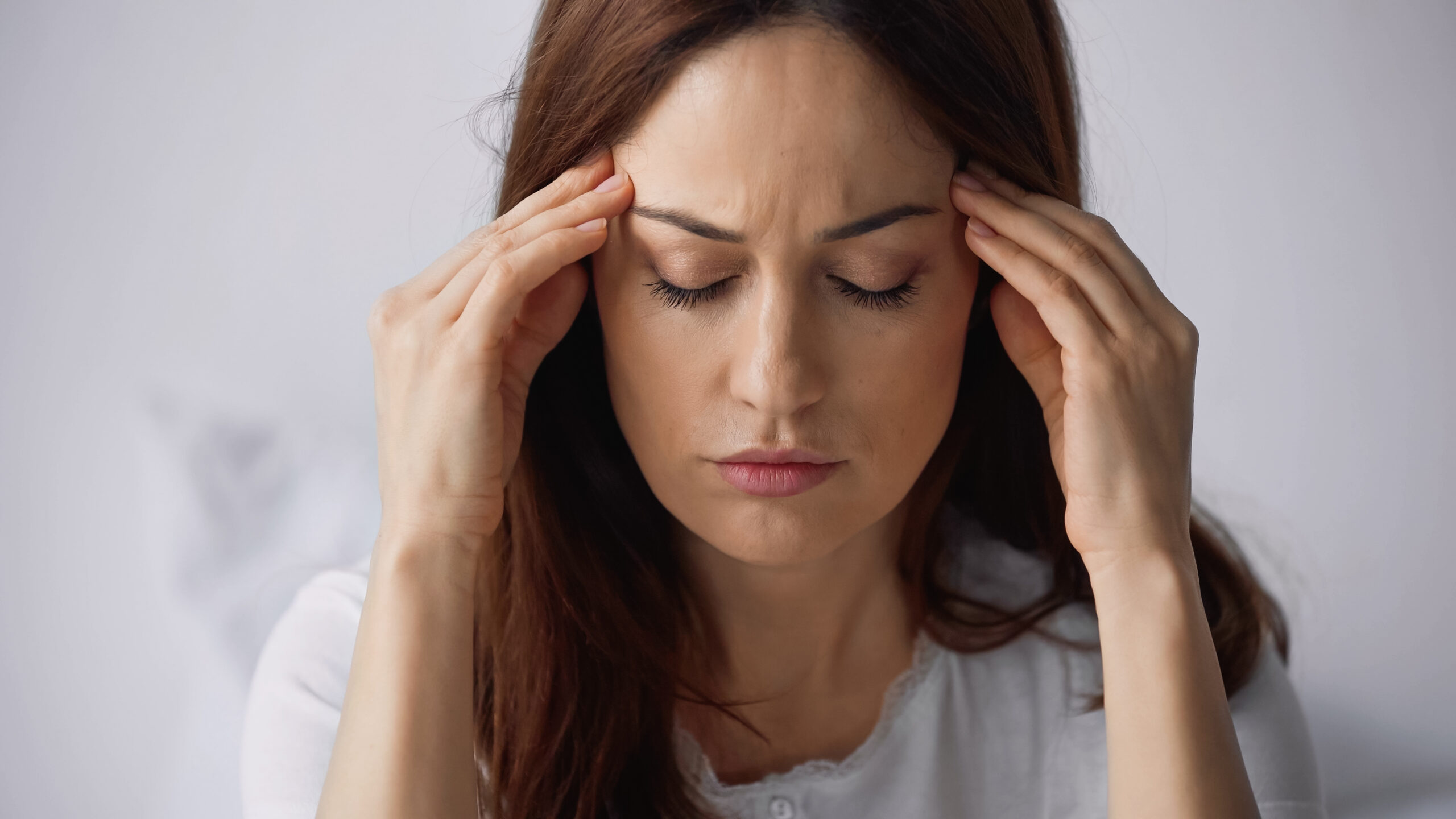 patient receiving acupuncture headache treatment